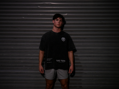 Christian gym clothes inspired by book of revelation & lion of Judah, oversized christian shirts, Mens christian clothing, black, front on model
