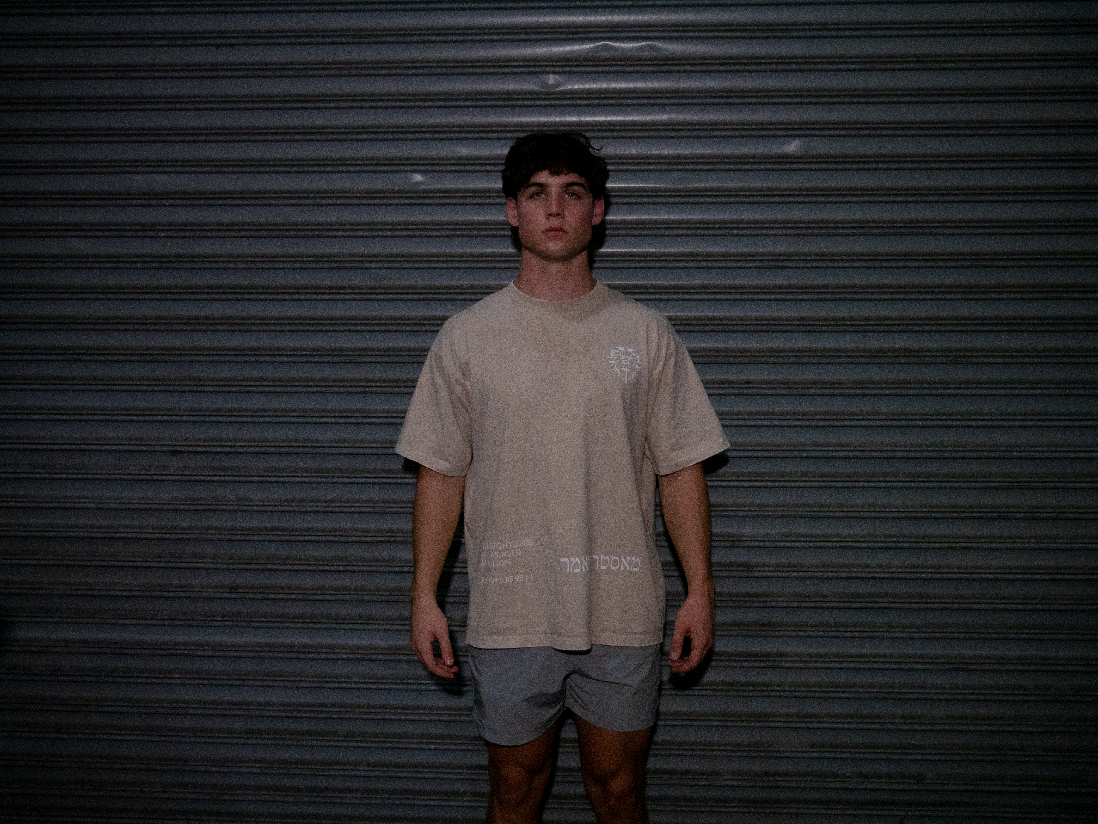 Christian gym clothes inspired by book of revelation & lion of Judah, oversized christian shirts, Mens christian clothing, tan, front on model
